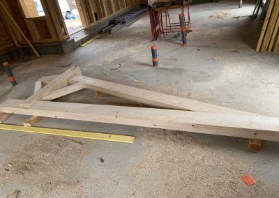 Vue d'une partie de la charpente apparente maison à ossature bois